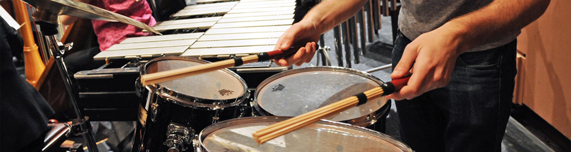 student-playing-drums