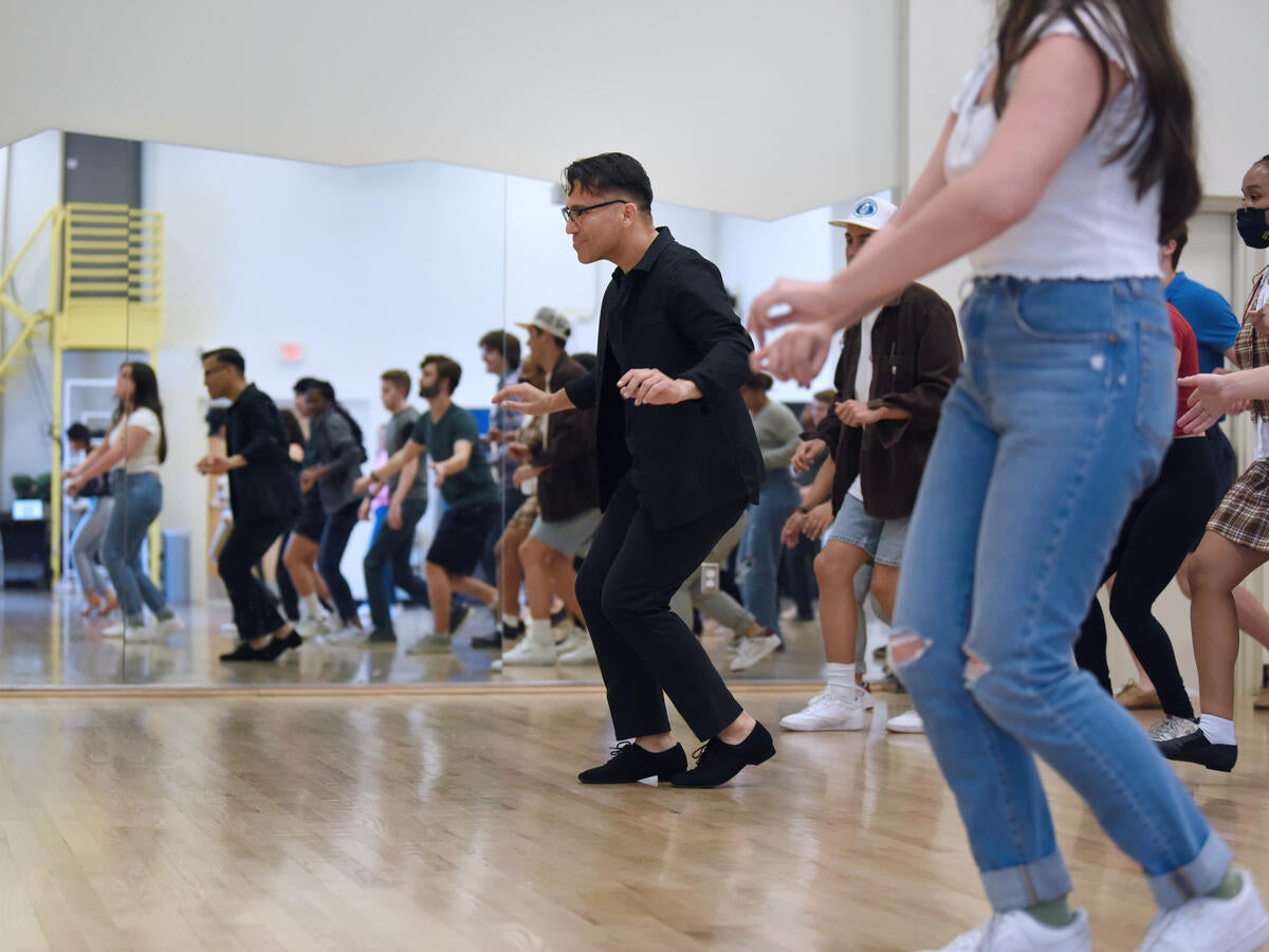 ASU professor teaches latin dance to a group of students
