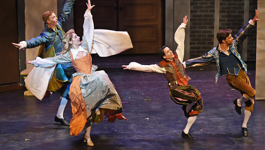 students dancing on stage