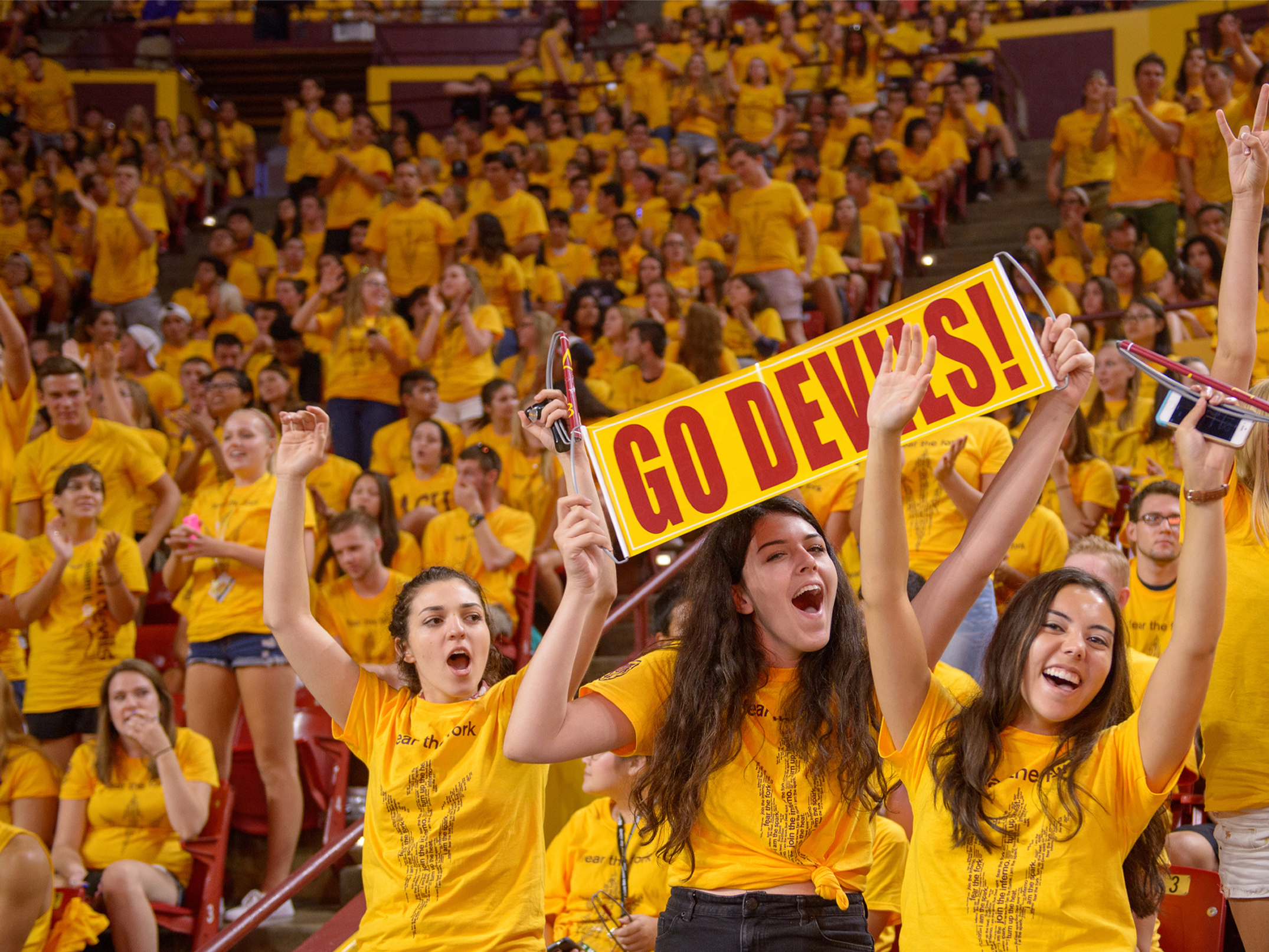 asu students cheering for team