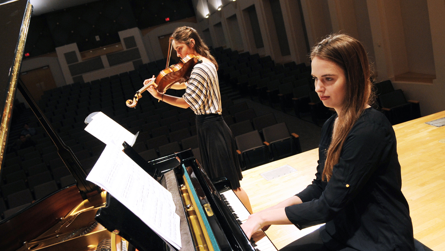 pianist accompanied by violin